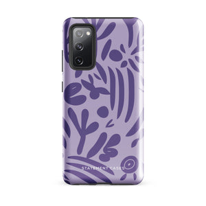 Introducing the Luna Morada for Samsung, a striking smartphone case from Statement Cases. This decorative purple cover boasts abstract floral and organic patterns in darker hues and is designed to absorb shocks. The impact-resistant case features a camera cutout that accommodates five lenses, with the brand name "STATEMENT CASES" elegantly printed at the bottom center.