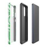 The Selva Verde for Samsung, a product by Statement Cases, is a durable, dual-layer phone case adorned with a green and white leafy design. The back of the case includes a camera cutout, and the bottom is printed with "Statement Cases.