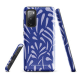 The Mariposa Azul for Samsung smartphone case from Statement Cases is adorned with an impact-resistant design featuring light purple abstract shapes on a blue background. This dual-layer case proudly displays the text "STATEMENT CASES" at the bottom, ensuring that the camera lenses and buttons of your phone remain clearly visible.