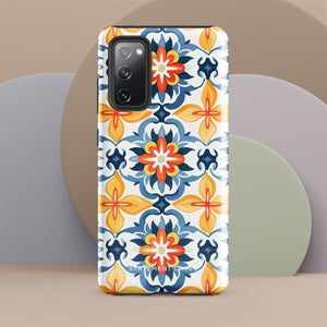 The Mediterranean Bloom for Samsung by Statement Cases features intricate, colorful floral patterns in blue, orange, and yellow. The design covers the entire back of the case, surrounding the camera cutout. Shock-absorbing and impact-resistant, it ensures protection while the brand "Statement Cases" is subtly printed near the bottom.