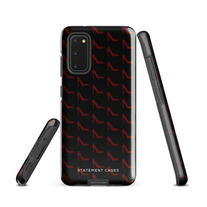 The Saucy Stillettos for Samsung features a case with a repeating red high heel pattern on a black background. The brand name "Statement Cases" is printed in white at the bottom of the tough phone case. The phone's multiple camera lenses are visible in the upper left corner, ensuring style meets durability.