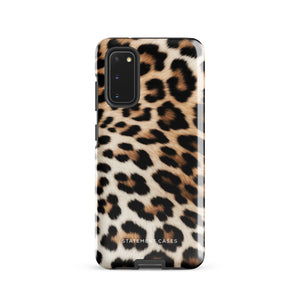 A tough phone case with a leopard print design is displayed. The dual-layer design features black and brown spots on a tan background, mimicking leopard fur. The text "Statement Cases" is printed on the lower part of the impact-resistant case. This is the Mighty Jaguar Fur for Samsung by Statement Cases.