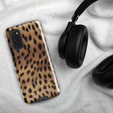 A smartphone with a leopard print, dual-layer design phone case featuring four camera lenses on the back is displayed against a white background. The bottom of the tough phone case has the brand name "Statement Cases" in white letters. The product name is "Daring Cheetah Fur for Samsung".