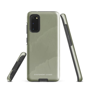 A Pistachio Haze for Samsung with a green phone case featuring a subtle floral pattern. This tough phone case has cutouts for three cameras and a flash, with the brand name "Statement Cases" printed at the bottom. The side buttons are visible, and there's a port at the bottom for easy access.