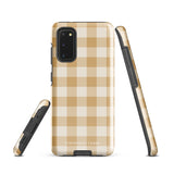 A beige and white checkered phone case is shown. Designed to fit a smartphone with a horizontal dual-camera setup, it features "STATEMENT CASES" printed at the bottom. This impact-resistant phone case offers both style and protection.Product Name: Gingham Grace for Samsung Brand Name: Statement Cases