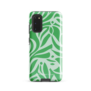 The Selva Verde for Samsung, a product by Statement Cases, is a durable, dual-layer phone case adorned with a green and white leafy design. The back of the case includes a camera cutout, and the bottom is printed with "Statement Cases.