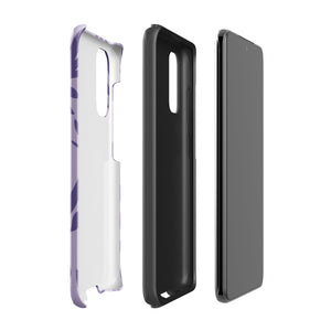 Introducing the Luna Morada for Samsung, a striking smartphone case from Statement Cases. This decorative purple cover boasts abstract floral and organic patterns in darker hues and is designed to absorb shocks. The impact-resistant case features a camera cutout that accommodates five lenses, with the brand name "STATEMENT CASES" elegantly printed at the bottom center.