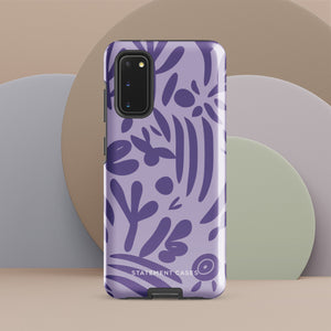 Introducing the Luna Morada for Samsung, a striking smartphone case from Statement Cases. This decorative purple cover boasts abstract floral and organic patterns in darker hues and is designed to absorb shocks. The impact-resistant case features a camera cutout that accommodates five lenses, with the brand name "STATEMENT CASES" elegantly printed at the bottom center.