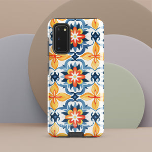 The Mediterranean Bloom for Samsung by Statement Cases features intricate, colorful floral patterns in blue, orange, and yellow. The design covers the entire back of the case, surrounding the camera cutout. Shock-absorbing and impact-resistant, it ensures protection while the brand "Statement Cases" is subtly printed near the bottom.