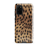 A smartphone with a leopard print, dual-layer design phone case featuring four camera lenses on the back is displayed against a white background. The bottom of the tough phone case has the brand name "Statement Cases" in white letters. The product name is "Daring Cheetah Fur for Samsung".