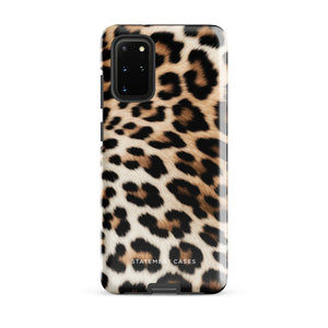 A tough phone case with a leopard print design is displayed. The dual-layer design features black and brown spots on a tan background, mimicking leopard fur. The text "Statement Cases" is printed on the lower part of the impact-resistant case. This is the Mighty Jaguar Fur for Samsung by Statement Cases.