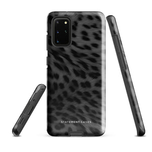 A Nocturnal Hunter Fur for Samsung with a black and gray leopard print phone case featuring a dual-layer design. The camera module has five lenses and a flash. The text "STATEMENT CASES" is written at the bottom of this impact-resistant case.