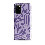 Introducing the Luna Morada for Samsung, a striking smartphone case from Statement Cases. This decorative purple cover boasts abstract floral and organic patterns in darker hues and is designed to absorb shocks. The impact-resistant case features a camera cutout that accommodates five lenses, with the brand name "STATEMENT CASES" elegantly printed at the bottom center.