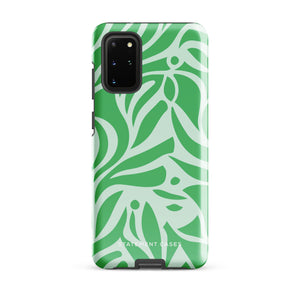 The Selva Verde for Samsung, a product by Statement Cases, is a durable, dual-layer phone case adorned with a green and white leafy design. The back of the case includes a camera cutout, and the bottom is printed with "Statement Cases.