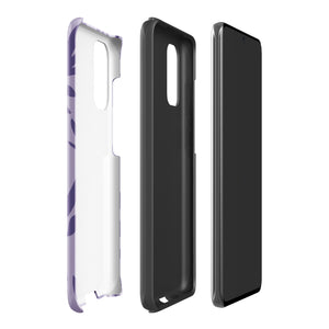 Introducing the Luna Morada for Samsung, a striking smartphone case from Statement Cases. This decorative purple cover boasts abstract floral and organic patterns in darker hues and is designed to absorb shocks. The impact-resistant case features a camera cutout that accommodates five lenses, with the brand name "STATEMENT CASES" elegantly printed at the bottom center.