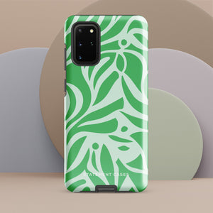 The Selva Verde for Samsung, a product by Statement Cases, is a durable, dual-layer phone case adorned with a green and white leafy design. The back of the case includes a camera cutout, and the bottom is printed with "Statement Cases.