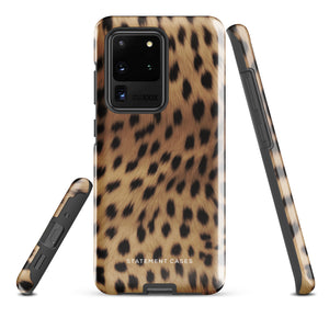 A smartphone with a leopard print, dual-layer design phone case featuring four camera lenses on the back is displayed against a white background. The bottom of the tough phone case has the brand name "Statement Cases" in white letters. The product name is "Daring Cheetah Fur for Samsung".