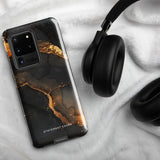 A **Midnight Volcano Marble for Samsung** with a sleek, black and gold marble-patterned, dual-layer design case by **Statement Cases**. The impact-resistant case features fluid, abstract swirls of black and gold, creating an elegant look. The camera module at the top left has five lenses.