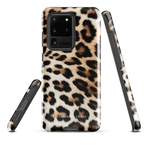 A tough phone case with a leopard print design is displayed. The dual-layer design features black and brown spots on a tan background, mimicking leopard fur. The text "Statement Cases" is printed on the lower part of the impact-resistant case. This is the Mighty Jaguar Fur for Samsung by Statement Cases.