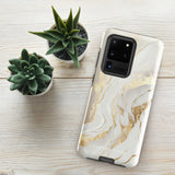 A Golden Elegance for Samsung is encased in a decorative, impact-resistant phone case with a marble-like design featuring white, beige, and gold swirls. The tough phone case covers the back and sides, with precise cutouts for the four-lens camera and buttons. The brand "Statement Cases" is printed at the bottom.