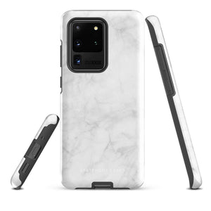 A dual-layer design smartphone case with a white marble pattern features three large camera lenses and a smaller one on the back. "Statement Cases" is subtly printed near the bottom. The minimalistic, matte finish offers impact-resistant protection with style.