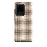 A Samsung smartphone with a beige and brown houndstooth patterned, impact-resistant case from Statement Cases. The phone features multiple cameras on the upper left side of its back. This tough Classic Houndstooth for Samsung phone case has a sleek, dual-layer design with precise cutouts for the cameras and buttons.