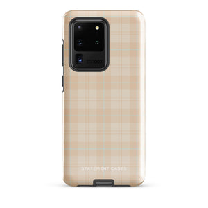 A smartphone with an impact-resistant beige plaid phone case featuring subtle light blue accents. The camera, flash, and sensor modules are visible at the top. The bottom part of the case has the text "Sophisticated Plaid for Samsung" printed on it by Statement Cases.