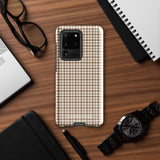 A Samsung smartphone with a beige and brown houndstooth patterned, impact-resistant case from Statement Cases. The phone features multiple cameras on the upper left side of its back. This tough Classic Houndstooth for Samsung phone case has a sleek, dual-layer design with precise cutouts for the cameras and buttons.