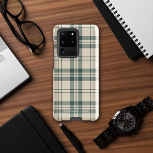 A beige and green plaid-patterned phone case designed to fit a smartphone. The dual-layer design ensures impact-resistant protection while maintaining a snug fit with precise cutouts for the camera and buttons. The brand name "Statement Cases" is subtly printed at the bottom.