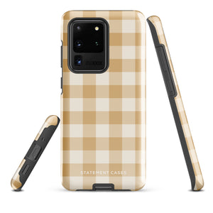 A beige and white checkered phone case is shown. Designed to fit a smartphone with a horizontal dual-camera setup, it features "STATEMENT CASES" printed at the bottom. This impact-resistant phone case offers both style and protection.Product Name: Gingham Grace for Samsung Brand Name: Statement Cases