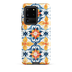 The Mediterranean Bloom for Samsung by Statement Cases features intricate, colorful floral patterns in blue, orange, and yellow. The design covers the entire back of the case, surrounding the camera cutout. Shock-absorbing and impact-resistant, it ensures protection while the brand "Statement Cases" is subtly printed near the bottom.