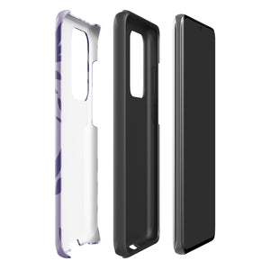 Introducing the Luna Morada for Samsung, a striking smartphone case from Statement Cases. This decorative purple cover boasts abstract floral and organic patterns in darker hues and is designed to absorb shocks. The impact-resistant case features a camera cutout that accommodates five lenses, with the brand name "STATEMENT CASES" elegantly printed at the bottom center.