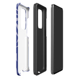 The Mariposa Azul for Samsung smartphone case from Statement Cases is adorned with an impact-resistant design featuring light purple abstract shapes on a blue background. This dual-layer case proudly displays the text "STATEMENT CASES" at the bottom, ensuring that the camera lenses and buttons of your phone remain clearly visible.