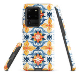 The Mediterranean Bloom for Samsung by Statement Cases features intricate, colorful floral patterns in blue, orange, and yellow. The design covers the entire back of the case, surrounding the camera cutout. Shock-absorbing and impact-resistant, it ensures protection while the brand "Statement Cases" is subtly printed near the bottom.