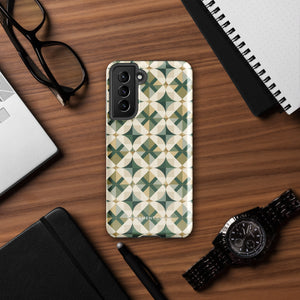 The Grand Estate Mosaic for Samsung features a geometric design with interlocking circles and X-shaped patterns in green, beige, and white tones. The impact-resistant, dual-layer design creates a modern, symmetrical appearance. "Statement Cases" is printed at the bottom of the case.