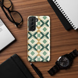 A smartphone with a dual-layer design case featuring a mix of green, beige, and tan shapes. The Old World Mosaic for Samsung has a "Statement Cases" logo at the bottom and is impact-resistant, ensuring your phone with its quad-camera setup stays protected.