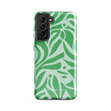 The Selva Verde for Samsung, a product by Statement Cases, is a durable, dual-layer phone case adorned with a green and white leafy design. The back of the case includes a camera cutout, and the bottom is printed with "Statement Cases.