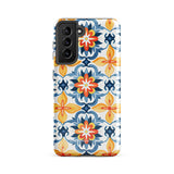 The Mediterranean Bloom for Samsung by Statement Cases features intricate, colorful floral patterns in blue, orange, and yellow. The design covers the entire back of the case, surrounding the camera cutout. Shock-absorbing and impact-resistant, it ensures protection while the brand "Statement Cases" is subtly printed near the bottom.