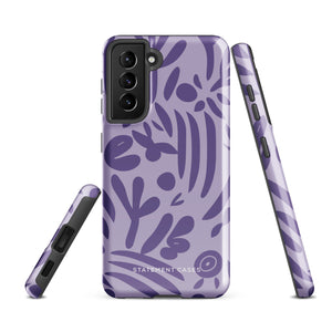 Introducing the Luna Morada for Samsung, a striking smartphone case from Statement Cases. This decorative purple cover boasts abstract floral and organic patterns in darker hues and is designed to absorb shocks. The impact-resistant case features a camera cutout that accommodates five lenses, with the brand name "STATEMENT CASES" elegantly printed at the bottom center.