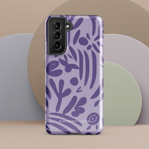 Introducing the Luna Morada for Samsung, a striking smartphone case from Statement Cases. This decorative purple cover boasts abstract floral and organic patterns in darker hues and is designed to absorb shocks. The impact-resistant case features a camera cutout that accommodates five lenses, with the brand name "STATEMENT CASES" elegantly printed at the bottom center.