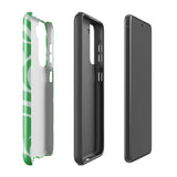 The Selva Verde for Samsung, a product by Statement Cases, is a durable, dual-layer phone case adorned with a green and white leafy design. The back of the case includes a camera cutout, and the bottom is printed with "Statement Cases.