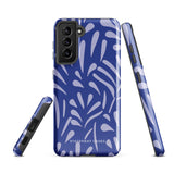 The Mariposa Azul for Samsung smartphone case from Statement Cases is adorned with an impact-resistant design featuring light purple abstract shapes on a blue background. This dual-layer case proudly displays the text "STATEMENT CASES" at the bottom, ensuring that the camera lenses and buttons of your phone remain clearly visible.