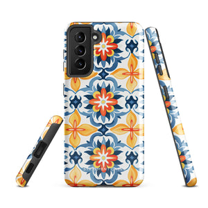 The Mediterranean Bloom for Samsung by Statement Cases features intricate, colorful floral patterns in blue, orange, and yellow. The design covers the entire back of the case, surrounding the camera cutout. Shock-absorbing and impact-resistant, it ensures protection while the brand "Statement Cases" is subtly printed near the bottom.