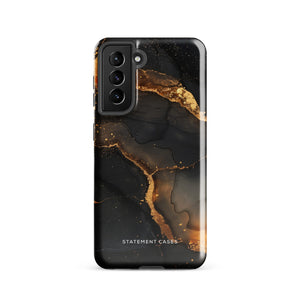 A **Midnight Volcano Marble for Samsung** with a sleek, black and gold marble-patterned, dual-layer design case by **Statement Cases**. The impact-resistant case features fluid, abstract swirls of black and gold, creating an elegant look. The camera module at the top left has five lenses.