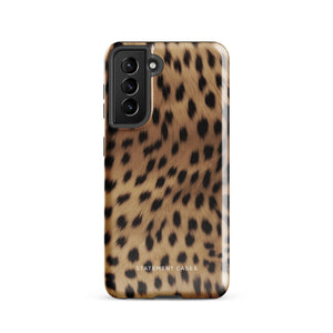 A smartphone with a leopard print, dual-layer design phone case featuring four camera lenses on the back is displayed against a white background. The bottom of the tough phone case has the brand name "Statement Cases" in white letters. The product name is "Daring Cheetah Fur for Samsung".