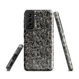 A phone case with a protective dual-layer design featuring an intricate black floral lace pattern. The Omerta Floral for Samsung has four camera cutouts and the brand name "Statement Cases" appears at the bottom center. Impact-resistant and chic, it stands against a plain white background.