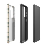 A beige and green plaid-patterned phone case designed to fit a smartphone. The dual-layer design ensures impact-resistant protection while maintaining a snug fit with precise cutouts for the camera and buttons. The brand name "Statement Cases" is subtly printed at the bottom.