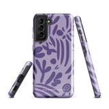 Introducing the Luna Morada for Samsung, a striking smartphone case from Statement Cases. This decorative purple cover boasts abstract floral and organic patterns in darker hues and is designed to absorb shocks. The impact-resistant case features a camera cutout that accommodates five lenses, with the brand name "STATEMENT CASES" elegantly printed at the bottom center.