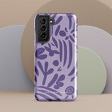 Introducing the Luna Morada for Samsung, a striking smartphone case from Statement Cases. This decorative purple cover boasts abstract floral and organic patterns in darker hues and is designed to absorb shocks. The impact-resistant case features a camera cutout that accommodates five lenses, with the brand name "STATEMENT CASES" elegantly printed at the bottom center.