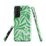 The Selva Verde for Samsung, a product by Statement Cases, is a durable, dual-layer phone case adorned with a green and white leafy design. The back of the case includes a camera cutout, and the bottom is printed with "Statement Cases.